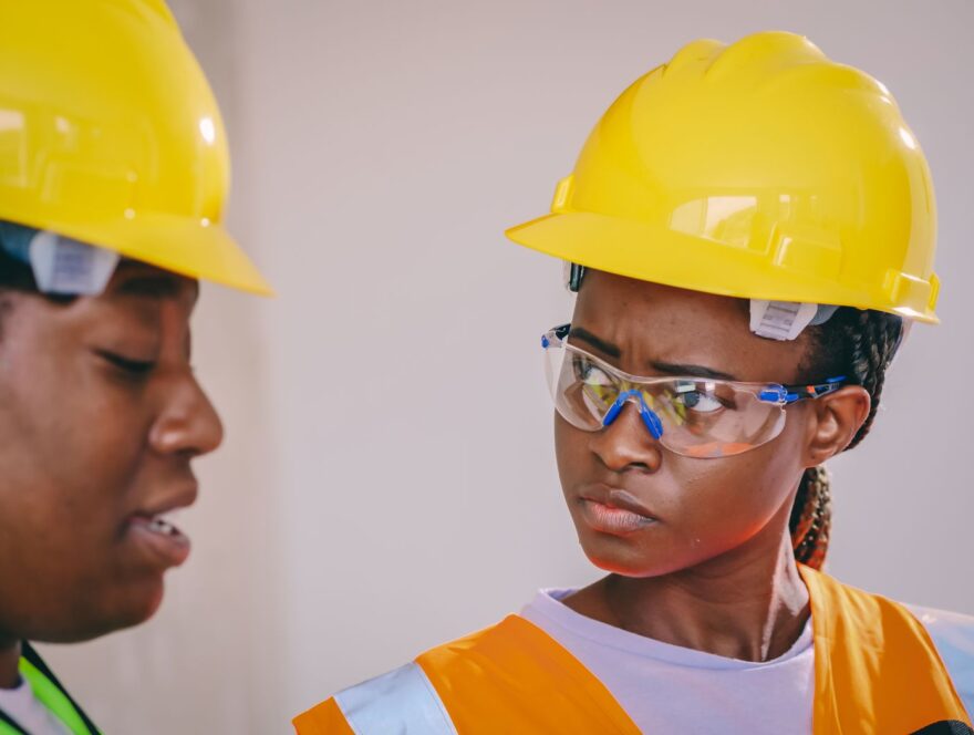 Woman in Yellow Hardhat — illustrative stock photograph